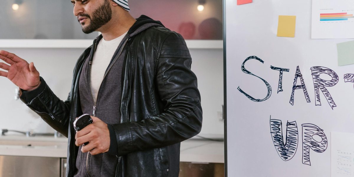 A small business owner feels accomplished seeing their brand's enhanced online presence.