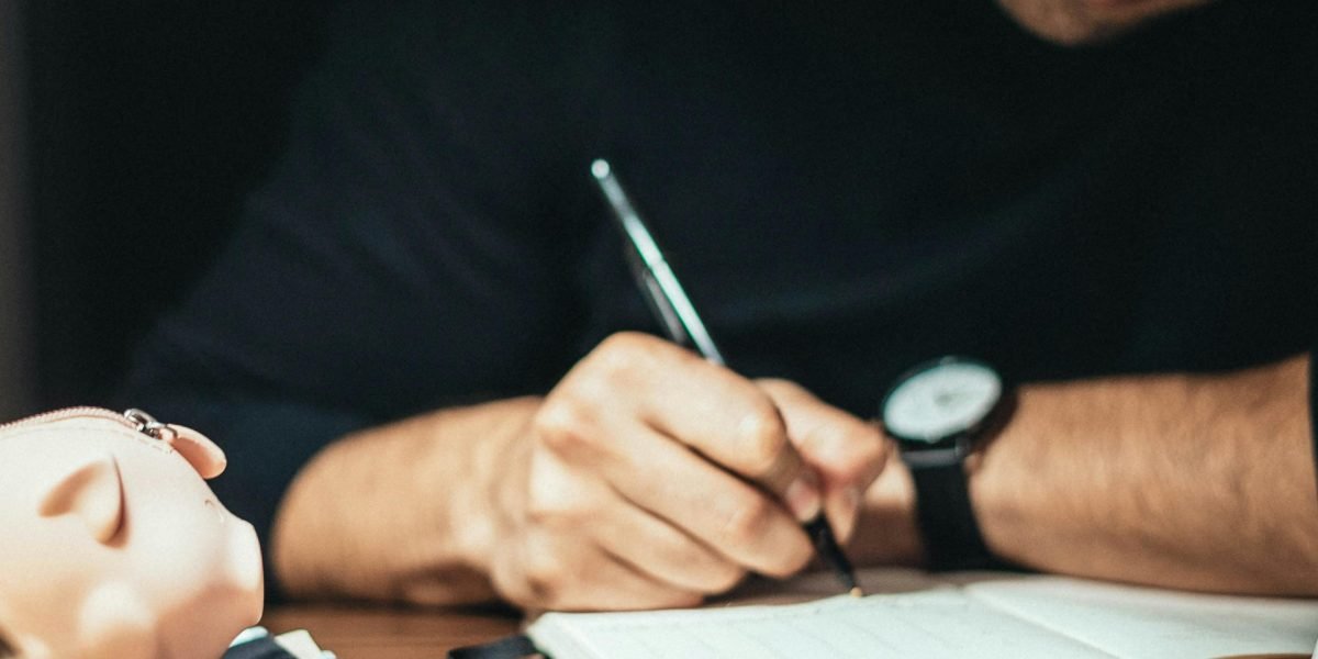 A person reviewing a budget or financial report with a look of concern, realizing unexpected or hidden costs.
