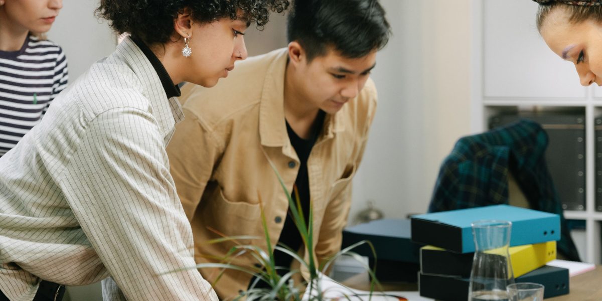 A team collaborating, representing the smooth migration and ease of use offered by Bluehost.