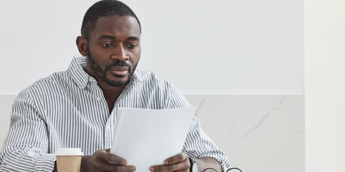 A person researching and asking critical questions before committing to a hosting provider.