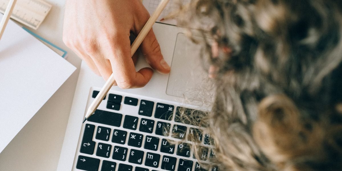 A small business owner experiences frustration due to a slow website, impacting online presence.