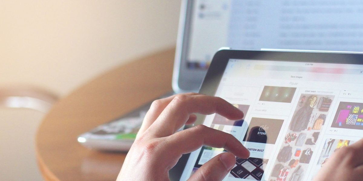 A person easily interacting with a digital interface, symbolizing the simplicity of using a drag-and-drop website builder.