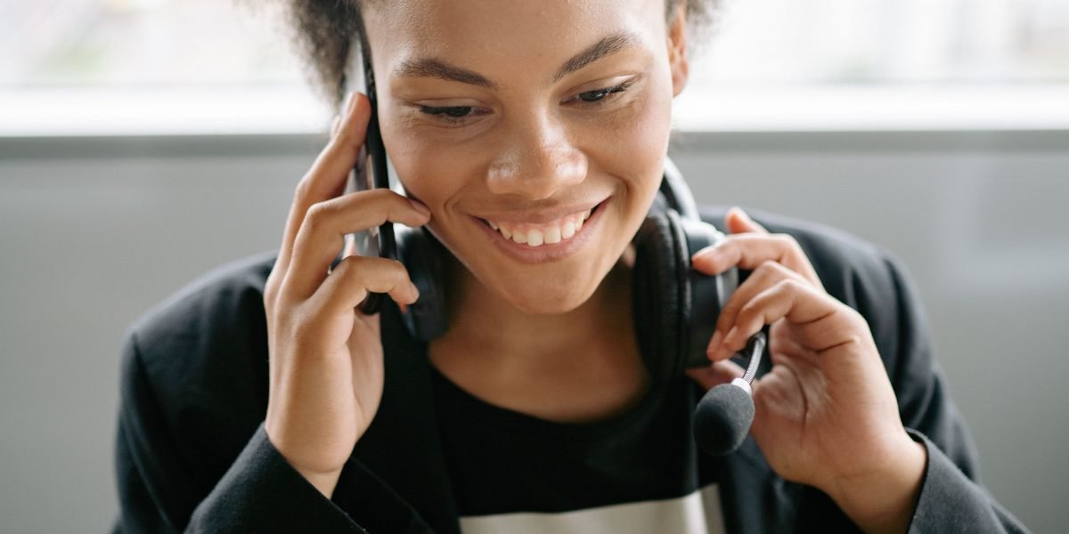 A person receiving support, highlighting the importance of accessible customer service for website owners.