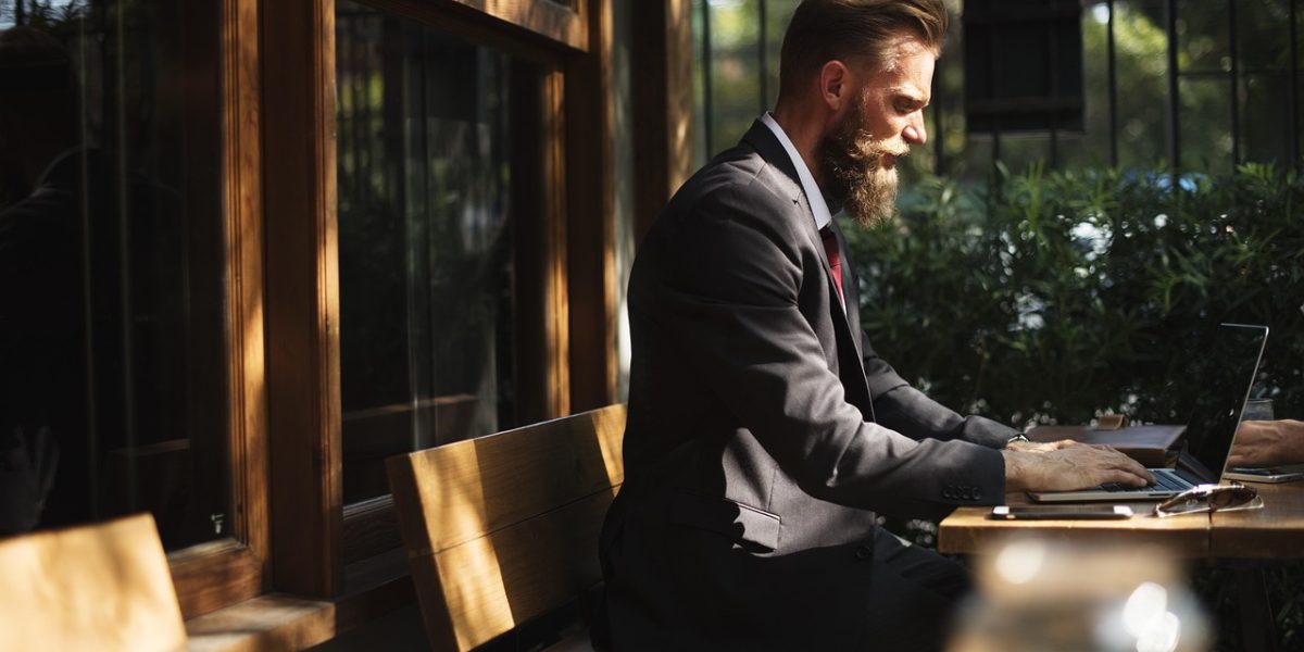 A person celebrating a successful business milestone, reflecting the ease and speed of launching a website with AI tools.