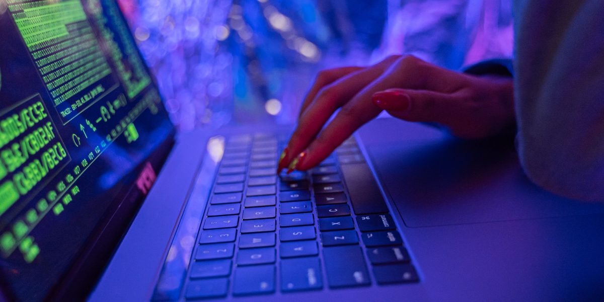 A person diligently working, symbolizing the ongoing effort required for digital security and protection.