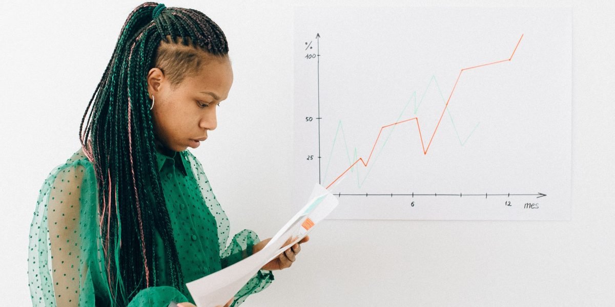 A small business owner confidently reviewing documents, focusing on growth.