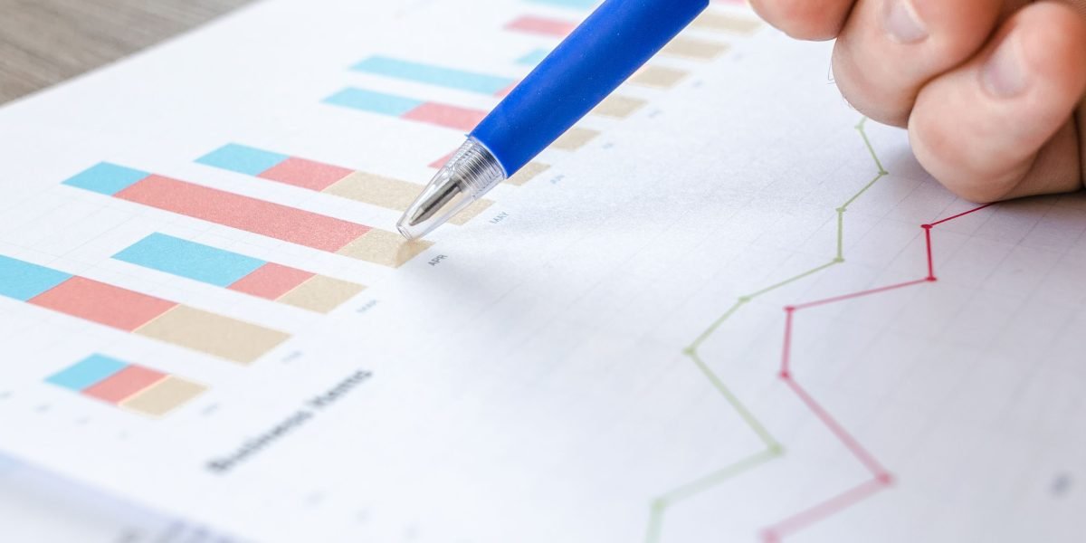 A manager confidently reviewing documents that highlight successful cost reduction strategies for cPanel licensing.