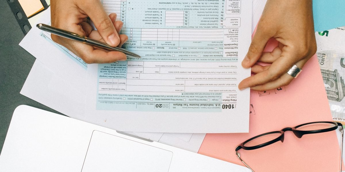 Individuals or small business owners carefully review their financial plans and recurring expenses.