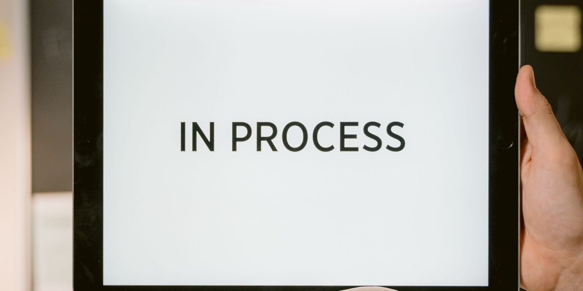 A person analyzing a complex flowchart or diagram, symbolizing the understanding of intricate domain pricing mechanics.