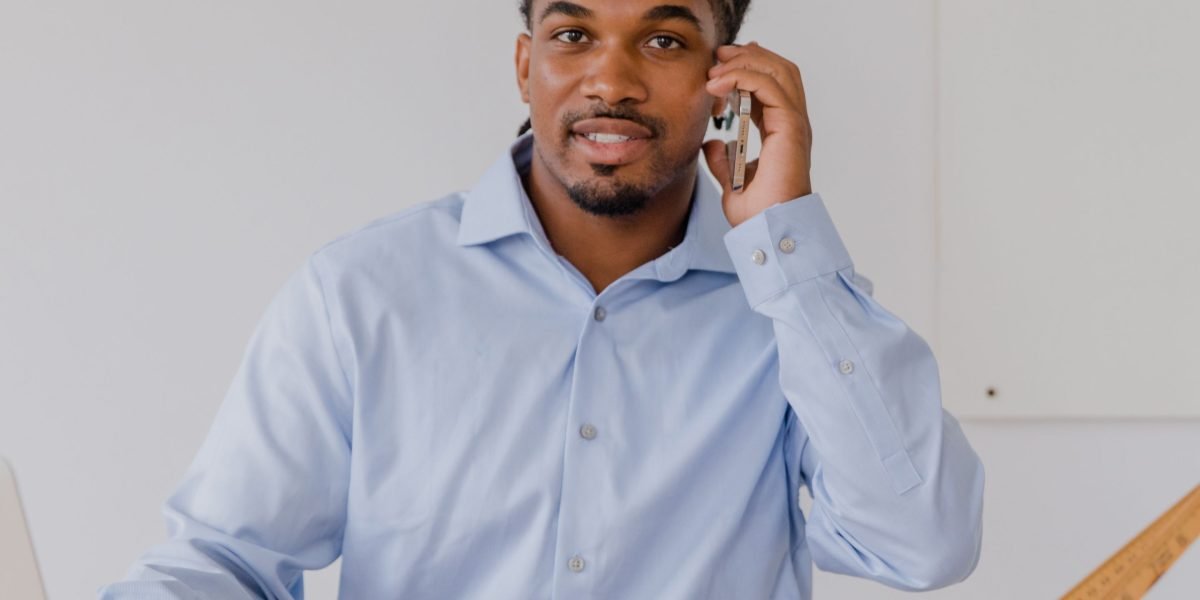 A business owner confidently focusing on their work, enabled by streamlined web hosting.