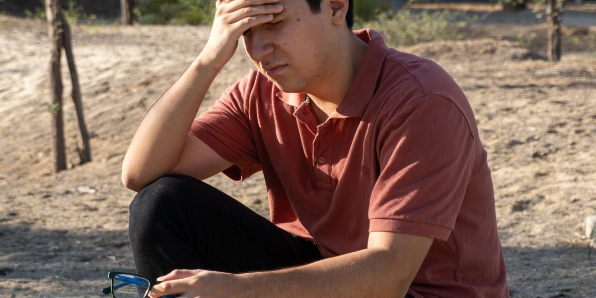An entrepreneur grappling with the complexities of web addresses, domain names, and web hosting.