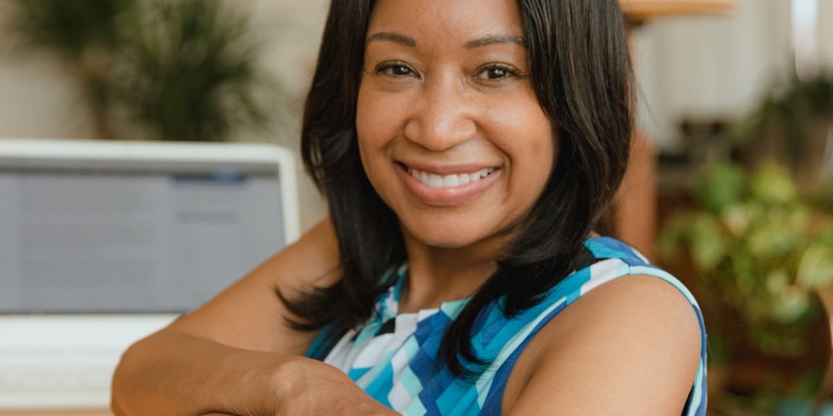 A business owner exuding confidence, assured in the robust security of their online platform.