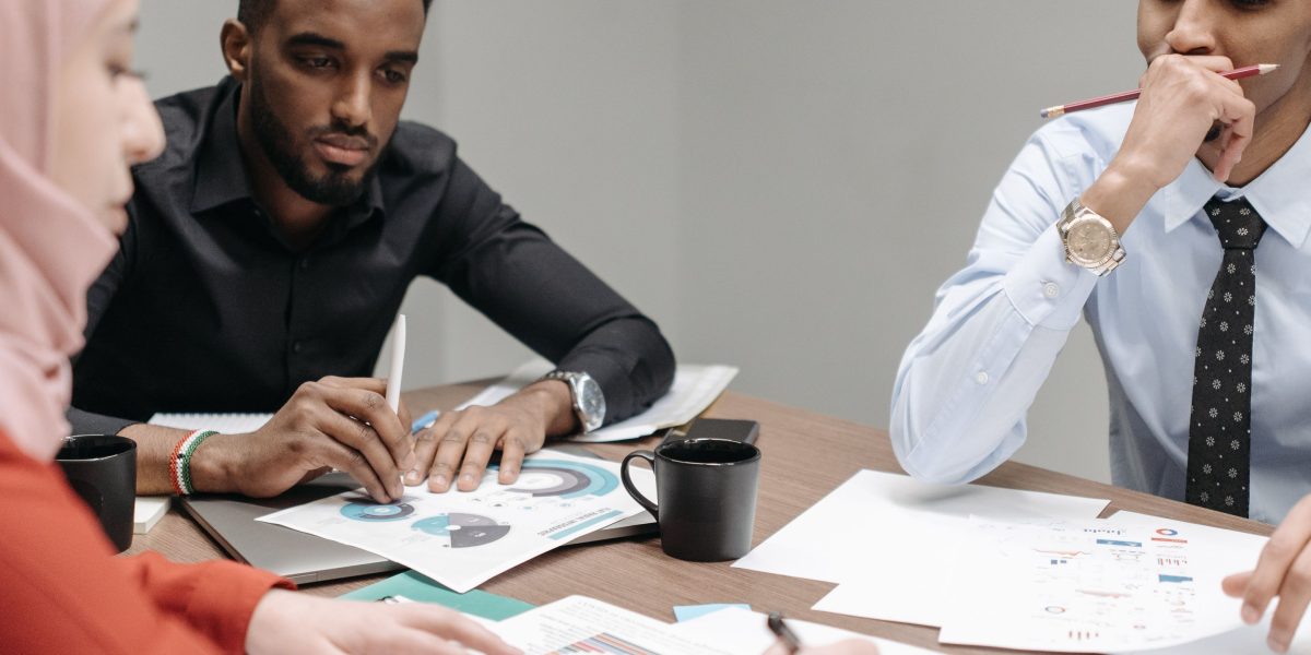 A team collaborating to make an important strategic decision for their business's future.