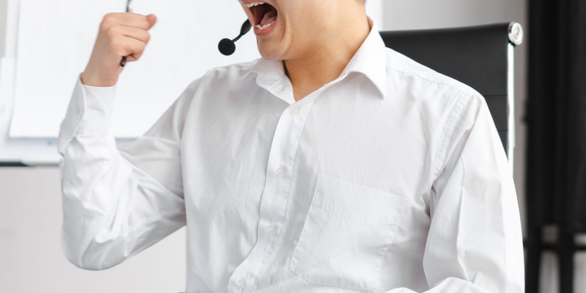 A person celebrating a successful online launch or business achievement with visible joy.
