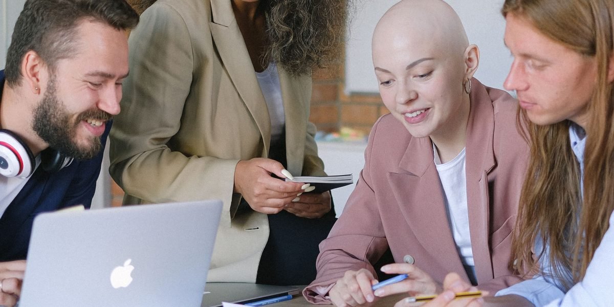 Professionals collaborating in an office, illustrating effective management and streamlined workflows for business growth.