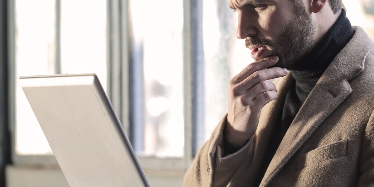 A professional contemplating important choices for their business's future.