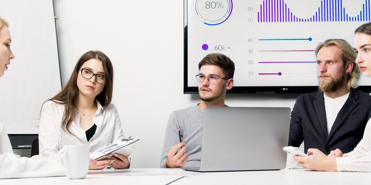 A team collaborating to develop and implement robust digital security strategies for their business.